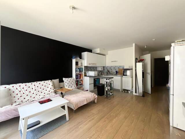 INVESTISSEUR - Appartement loué de 2 pièces au RDC — photo du bien