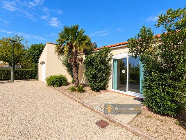 Maison de plain-pied 104 m² – 3 chambres, garage et jardin — photo du bien