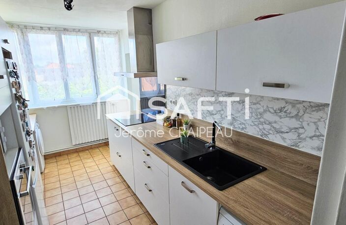 Secteur Gare : Appartement de 98m² avec 3 chambres, balcon, cave et garage. — photo 3