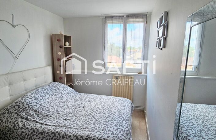 Secteur Gare : Appartement de 98m² avec 3 chambres, balcon, cave et garage. — photo 5