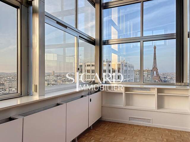 Duplex dernier étage vue tour Eiffel — photo du bien