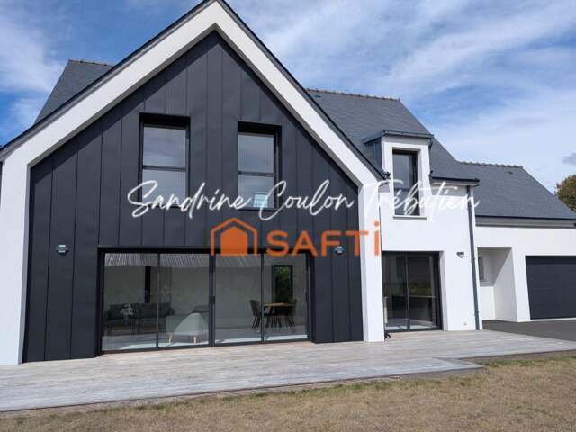 Maison contemporaine - 800 m² de terrain - plain pied — photo du bien