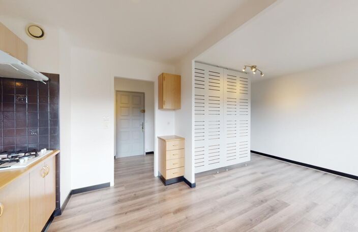 T1 bis avec balcon, stationnement, cave et vue dégagée – idéal premier achat ou investissement — photo 2
