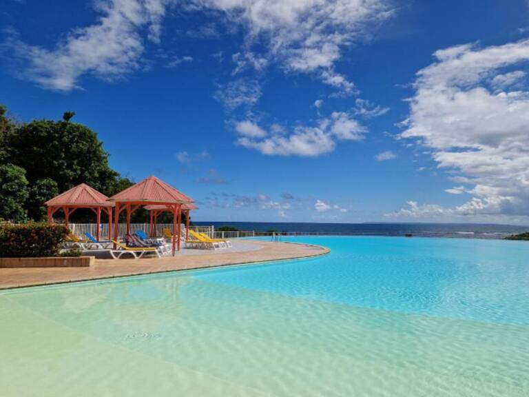 SAINT FRANCOIS (971) ANSE DES ROCHERS STUDIO/T1 B MEUBLE DANS RESIDENCE AVEC PISCINE A 2 PAS DES PLAGES — photo 1
