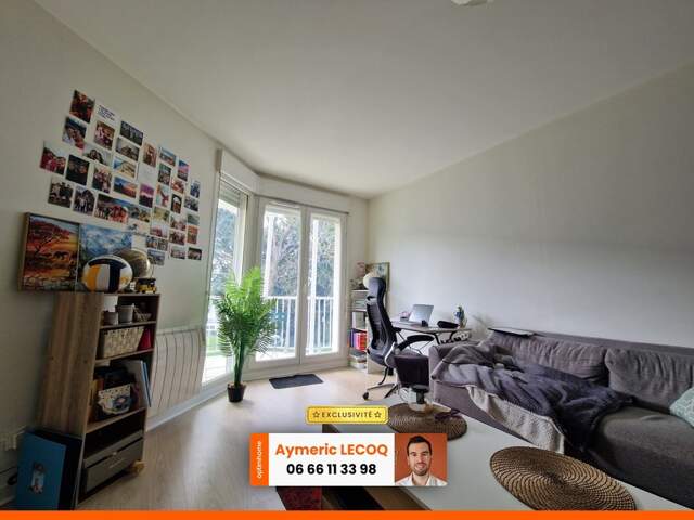 T2 avec balcon vue sur Loire et parc boisé — photo du bien