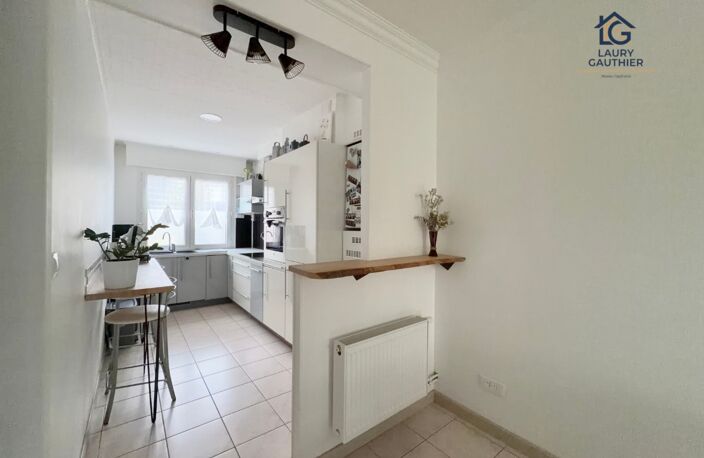 HOUPLINES BOURG — Maison rénovée avec 3 chambres, jardin exposé sud et garage — photo 3