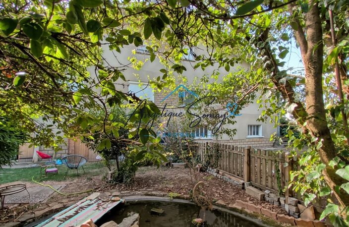 Maison jumelée avec jardin arboré, mezzanine et grand garage.VAULX EN VELIN — photo 3