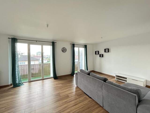 Appartement T3 avec garage, cave et balcon — photo du bien