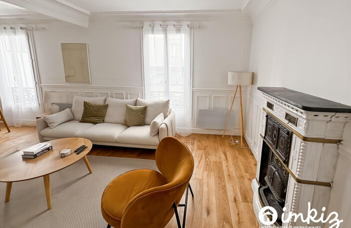 Paris 9e - 51 m² de caractère, parquet et cheminée — photo 2
