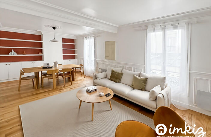 Paris 9e - 51 m² de caractère, parquet et cheminée — photo 3