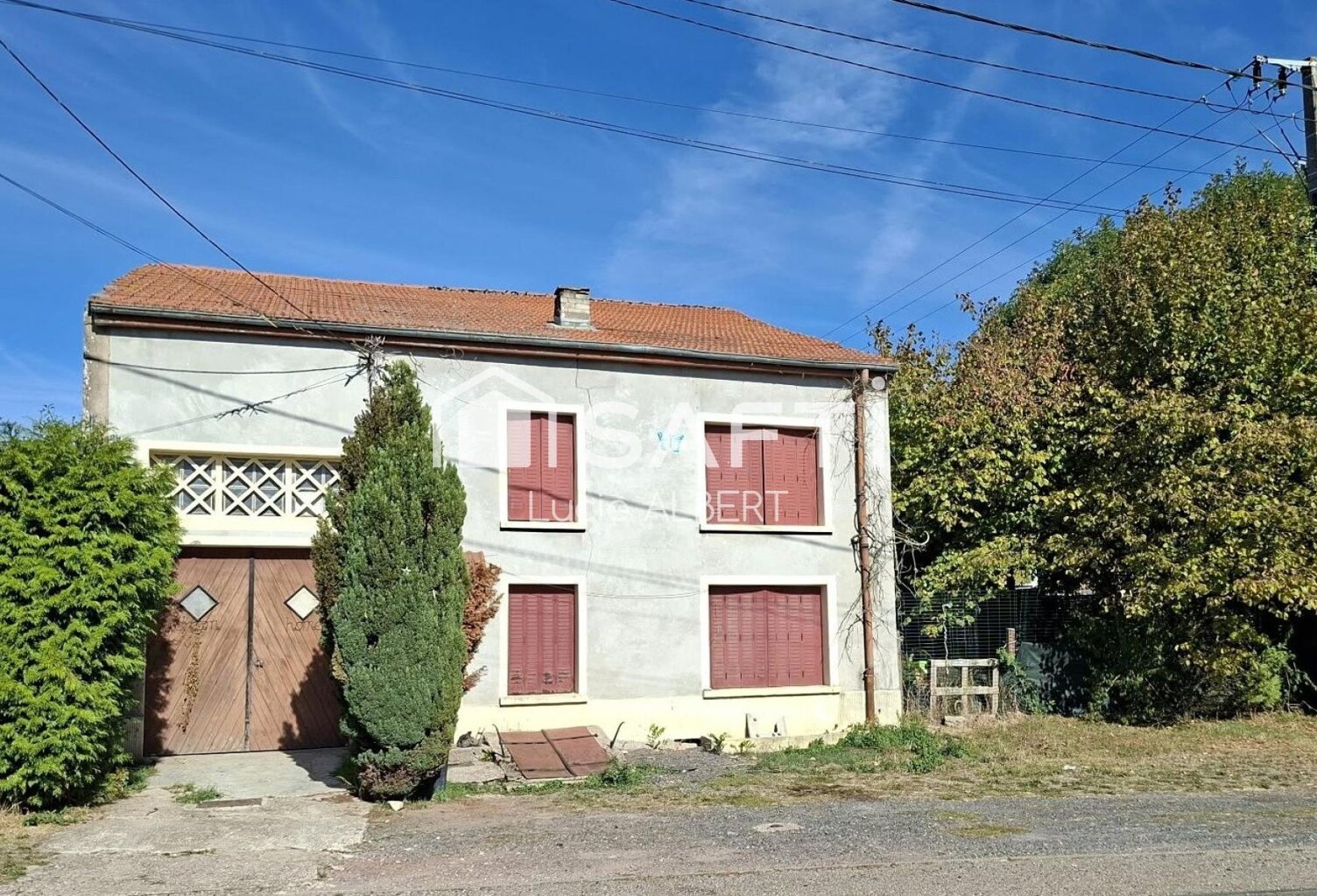 Une maison à rénover offrant un fort potentiel — photo 1
