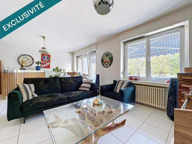 Appartement T3 de 70m2 avec 2 chambres, balcon, cave et garage — photo du bien