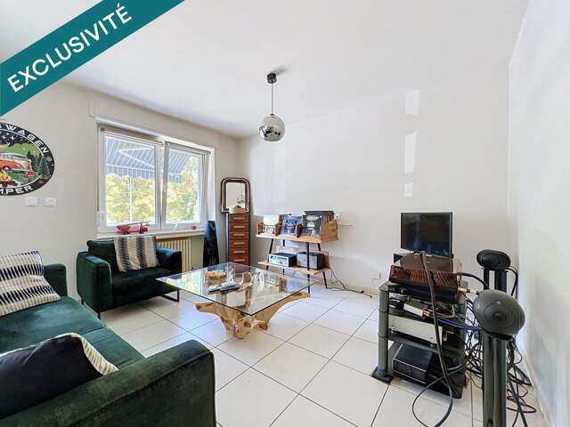 Appartement T3 de 70m2 avec 2 chambres, balcon, cave et garage — photo du bien