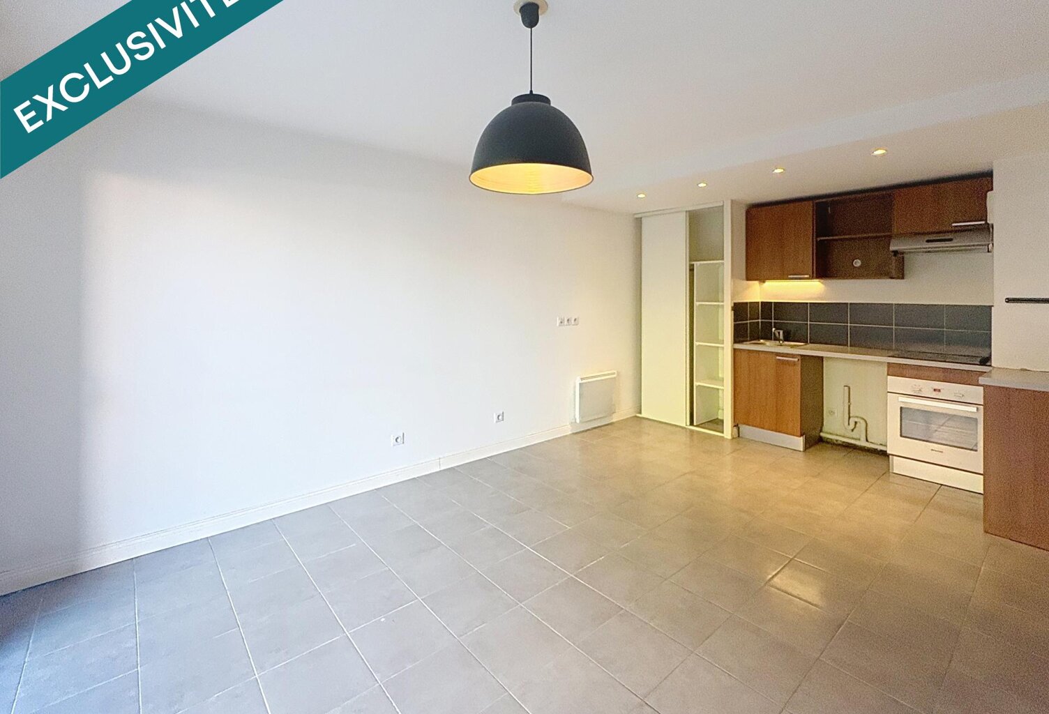 APPARTEMENT AU CALME, PROCHE DE TOUTES COMMODITES — photo 1