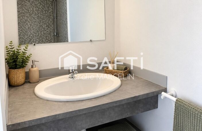UN APPARTEMENT T3 AVEC SON PROPRE JARDIN ET PARKING — photo 3