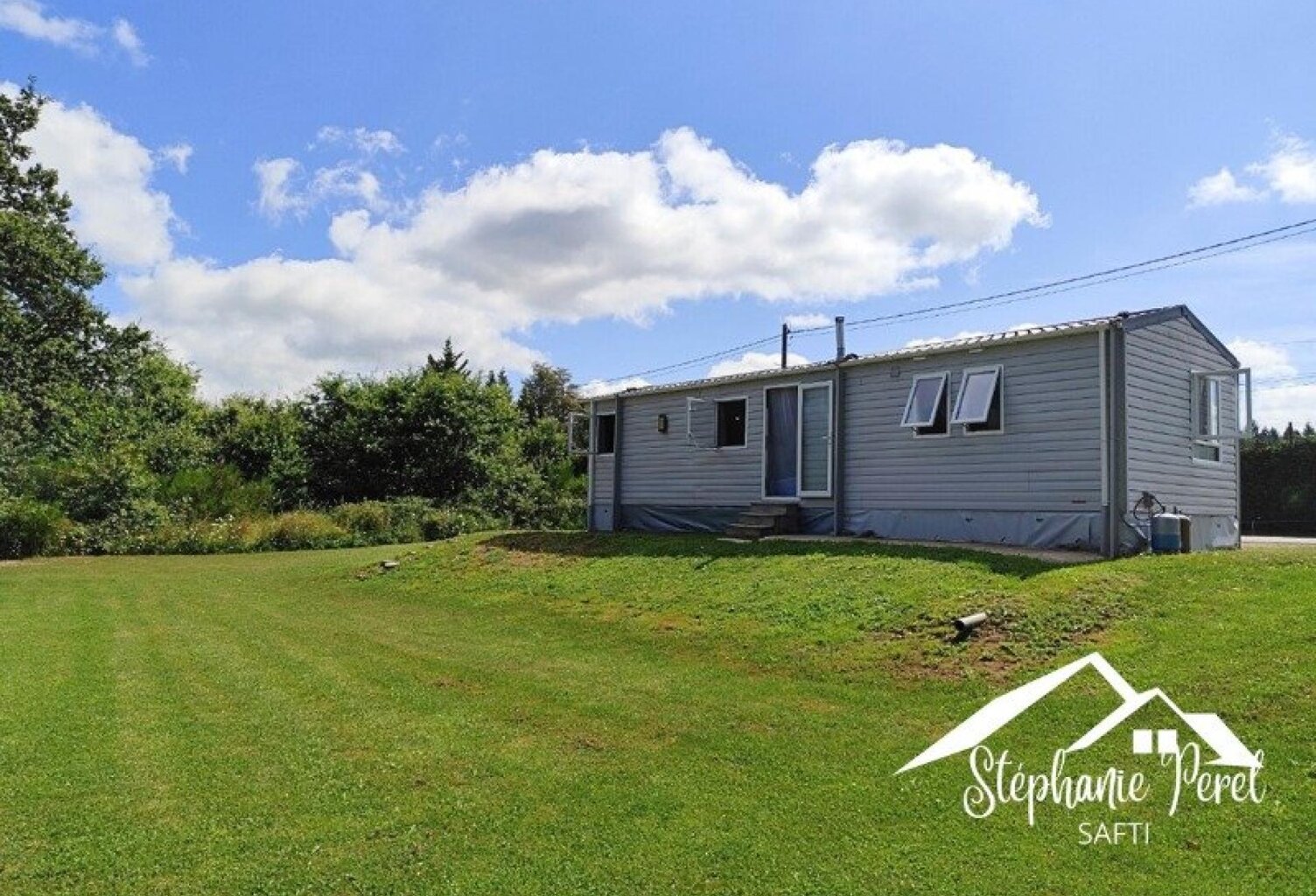 Investissez dans le calme : terrain avec mobil home et potentiel locatif. — photo 1
