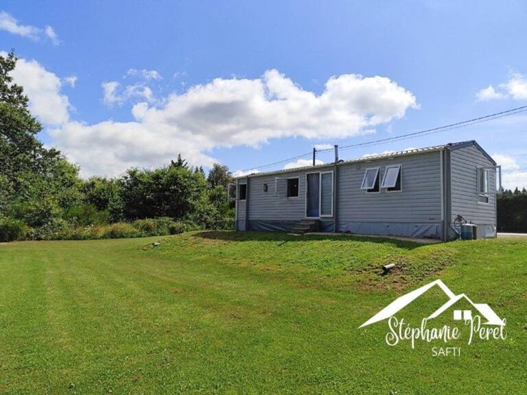 Investissez dans le calme : terrain avec mobil home et potentiel locatif. — photo 1