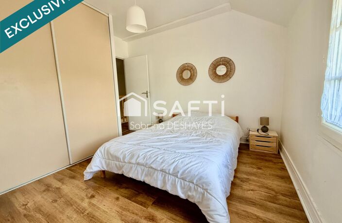 ENSEMBLE IMMOBILIER COMPOSÉ DE 2 MAISONS, CAVE, GARAGE ET JARDIN CLOS — photo 5