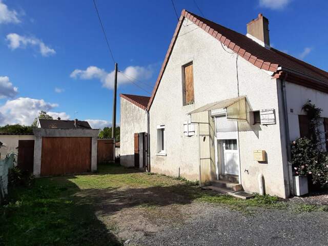 MAISON MITOYENNE PLAIN PIED AVEC POTENTIEL D'AMÉNAGEMENT — photo du bien