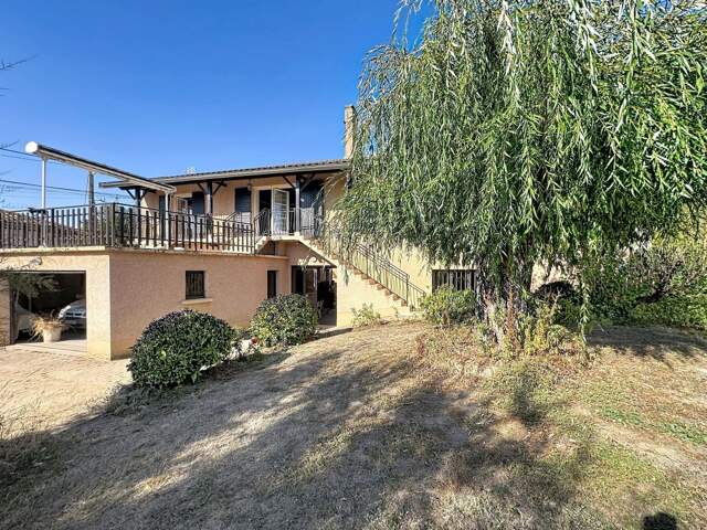 Saint-Georges-de-Reneins : Maison de 4 pièces avec atelier de 90 m², garage, terrasse et jardin — photo du bien
