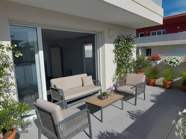 30.GARD.NIMES. Appartement de standing de 69 m² avec terrasse de 46 m² et double garage dans résidence sécurisée — photo 1