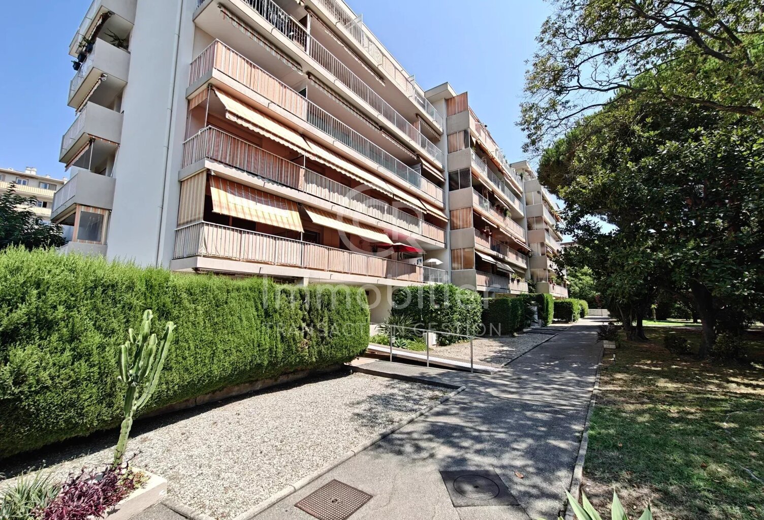 T3 TRAVERSANT SUD-NORD 62M² REZ-DE-JARDIN — photo 1