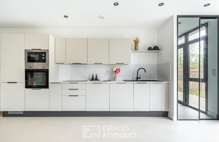 Appartement type loft rénové contemporain avec jardin privatif — photo 5