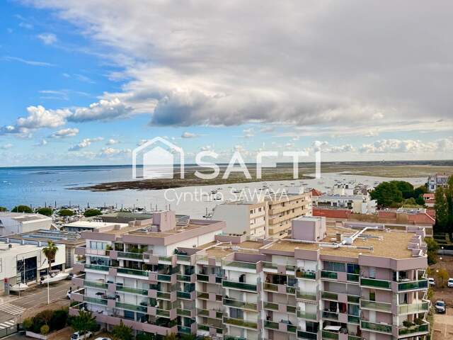 Appartement T2 avec vue bassin, avec balcon, ascenseur et place de parking! — photo du bien