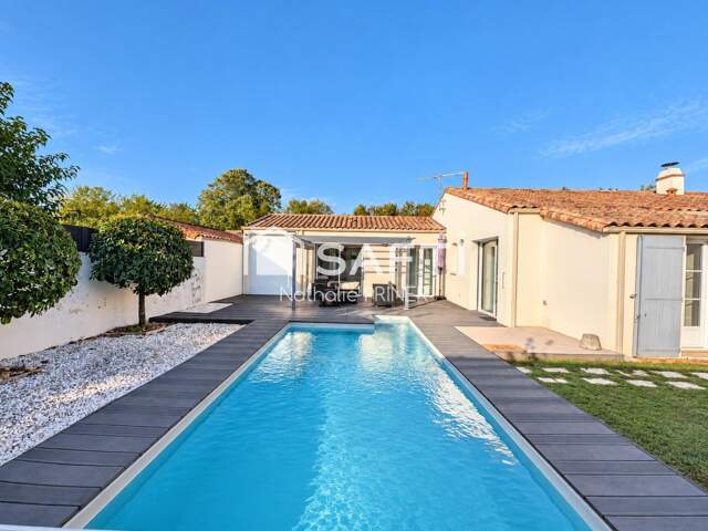 Agréable plain-pied avec piscine à Vouillé — photo du bien