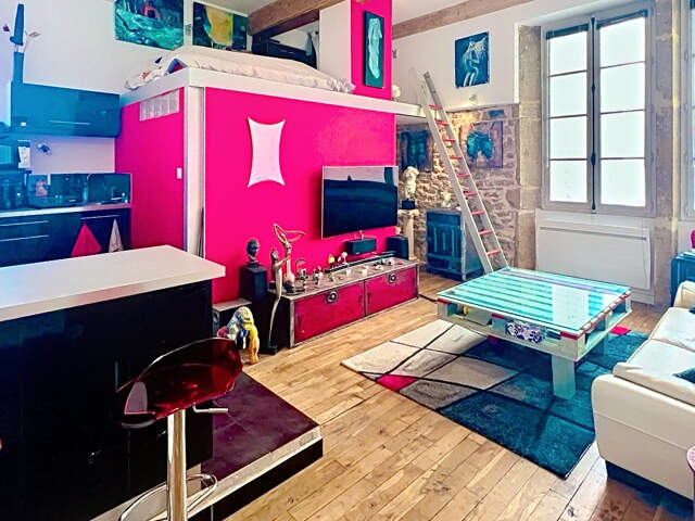 LYON 1 - SECTEUR TERREAUX / HÔTEL DE VILLE - T2 DE 53 M² AVEC MEZZANINE, AU CALME D'UNE TRABOULE — photo du bien