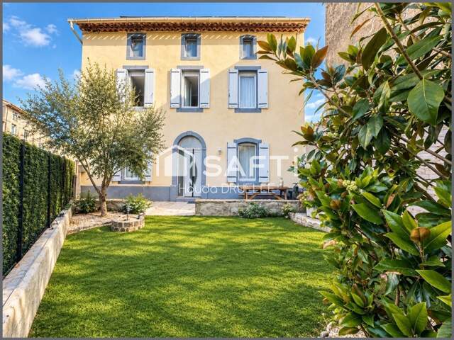 Maison atypique de 170 m² avec 3 cours, grenier aménageable et stationnement privatif — photo du bien