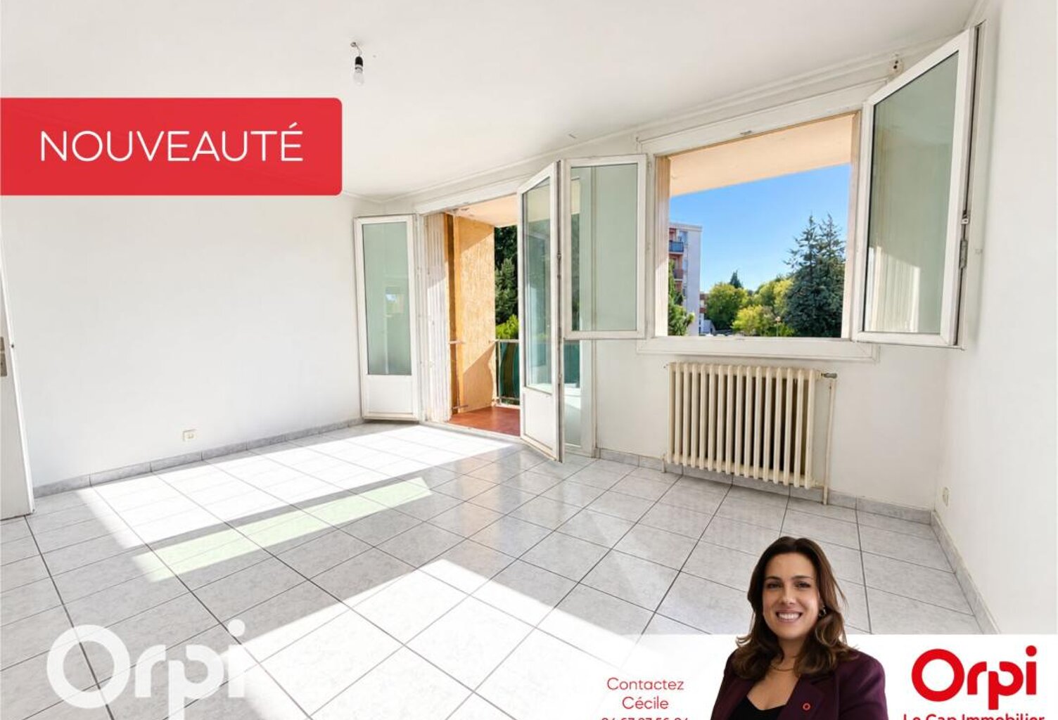 T3 traversant de 68 m² avec 2 terrasses, climatisation, parking et cave de 10 m² — photo 1