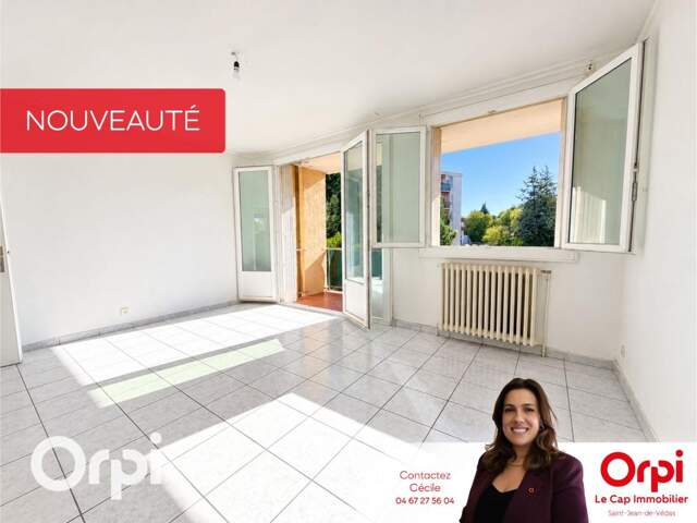 T3 traversant de 68 m² avec 2 terrasses, climatisation, parking et cave de 10 m² — photo du bien