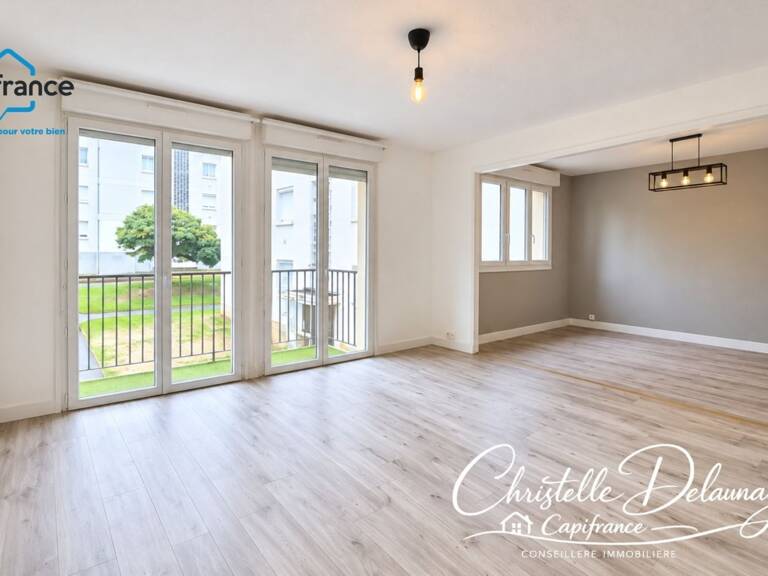 À VENDRE – BEL APPARTEMENT DE 65 M² AVEC BALCON, PARKING ET CAVE À LAVAL — photo 1