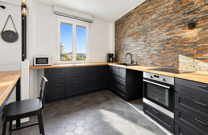 Courbevoie – Bécon-les-Bruyères – 4 pièces de 105 m² avec balcon filant, box et cave — photo 4