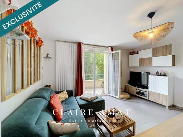 Duplex 3 pièces avec balcon et deux stationnements couverts — photo du bien