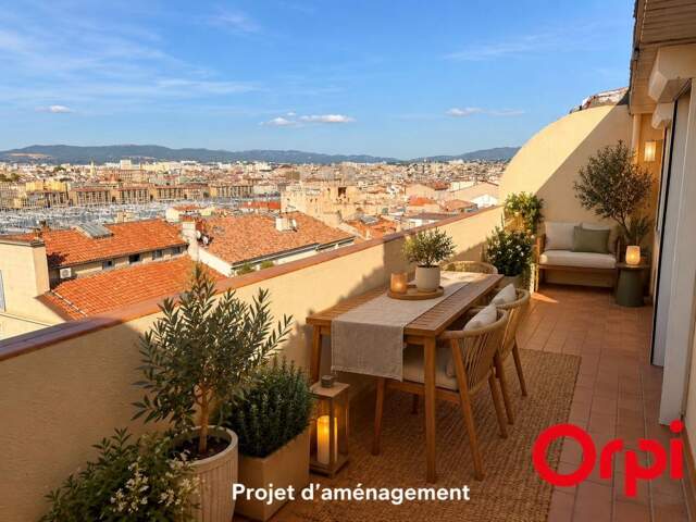 APPARTEMENT T3/4 MARSEILLE 13007 – DERNIER ÉTAGE – VUE MER PANORAMIQUE – TERRASSE ET BALCONS — photo du bien