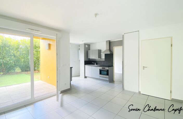 Appartement à louer 2 pièces SAINT PRIEST (69) Quartier Revaison avec jardin et garage Résidence 2015 — photo 2