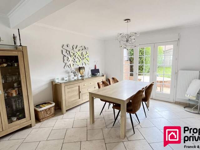 NOUVEAUTÉ ? UNE MAISON FAMILIALE AUX BEAUX VOLUMES, AVEC JARDIN PLEIN SUD ! — photo du bien