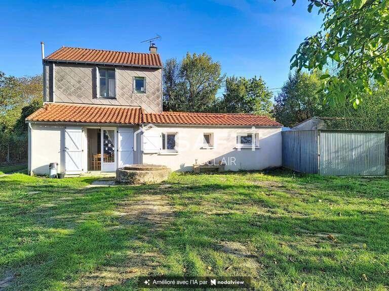 Maison de 93m² sur terrain de 1000m², 4 garages. — photo 1