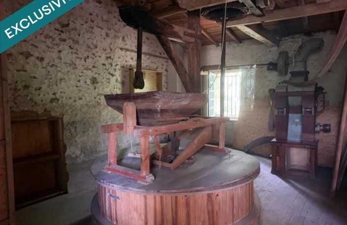 PROPRIETE D EXEPTION AVEC MOULIN A EAU, MAISON, BOURRINE ET GRANGE AVEC 6 HECTARES — photo 4