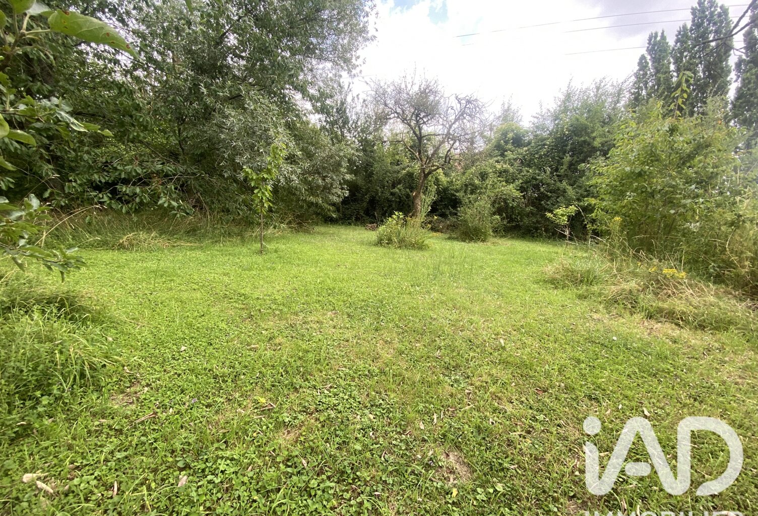 Vente Terrain 1 303 m&sup2; — photo 1