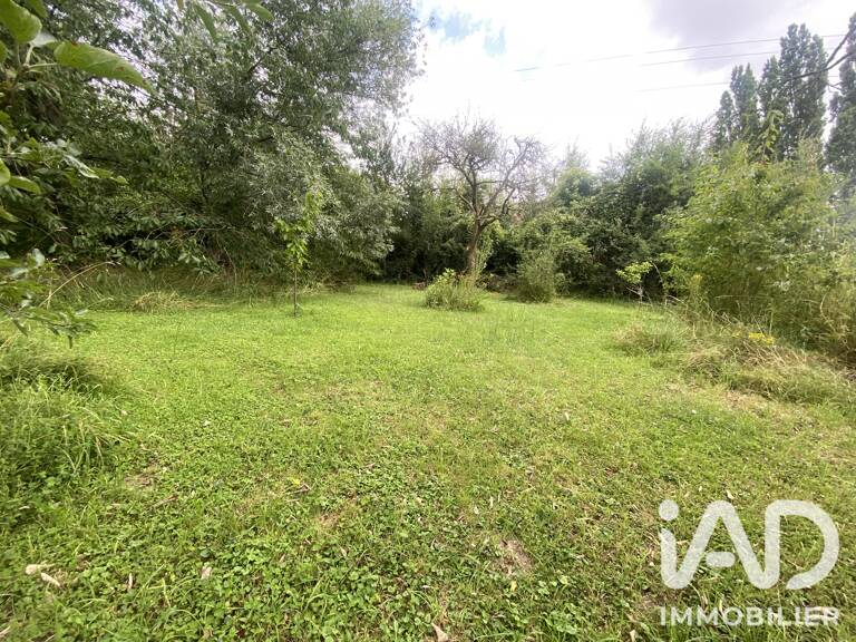 Vente Terrain 1 303 m&sup2; — photo 1