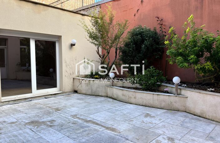 Grande maison en coeur de ville avec garage et patio — photo 2
