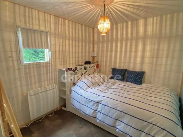 LACANAU - MAISON STYLE CHALET SCANDINAVE - 5 PIECES - 73M2 - TERRASSE ET TERRAIN - AU COEUR D'UN DOMAINE NAUTIQUE — photo du bien