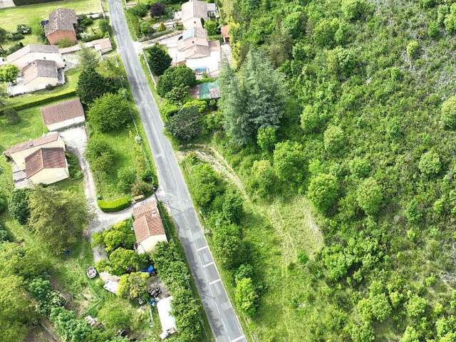Terrain dominant de 5 200 m² vue dégagée, projet de villa validé — photo du bien