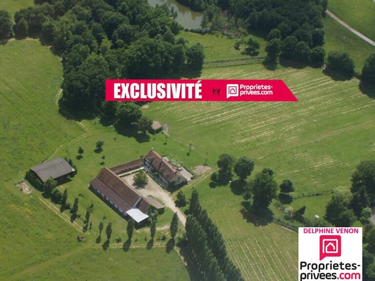 Exclusivité - Propriété avec beaucoup de cachet proche de Tigy ; Longère, Ecuries, piste d'entrainement, prés, bois et plan d'eau sur  20 hectares environ — photo 1