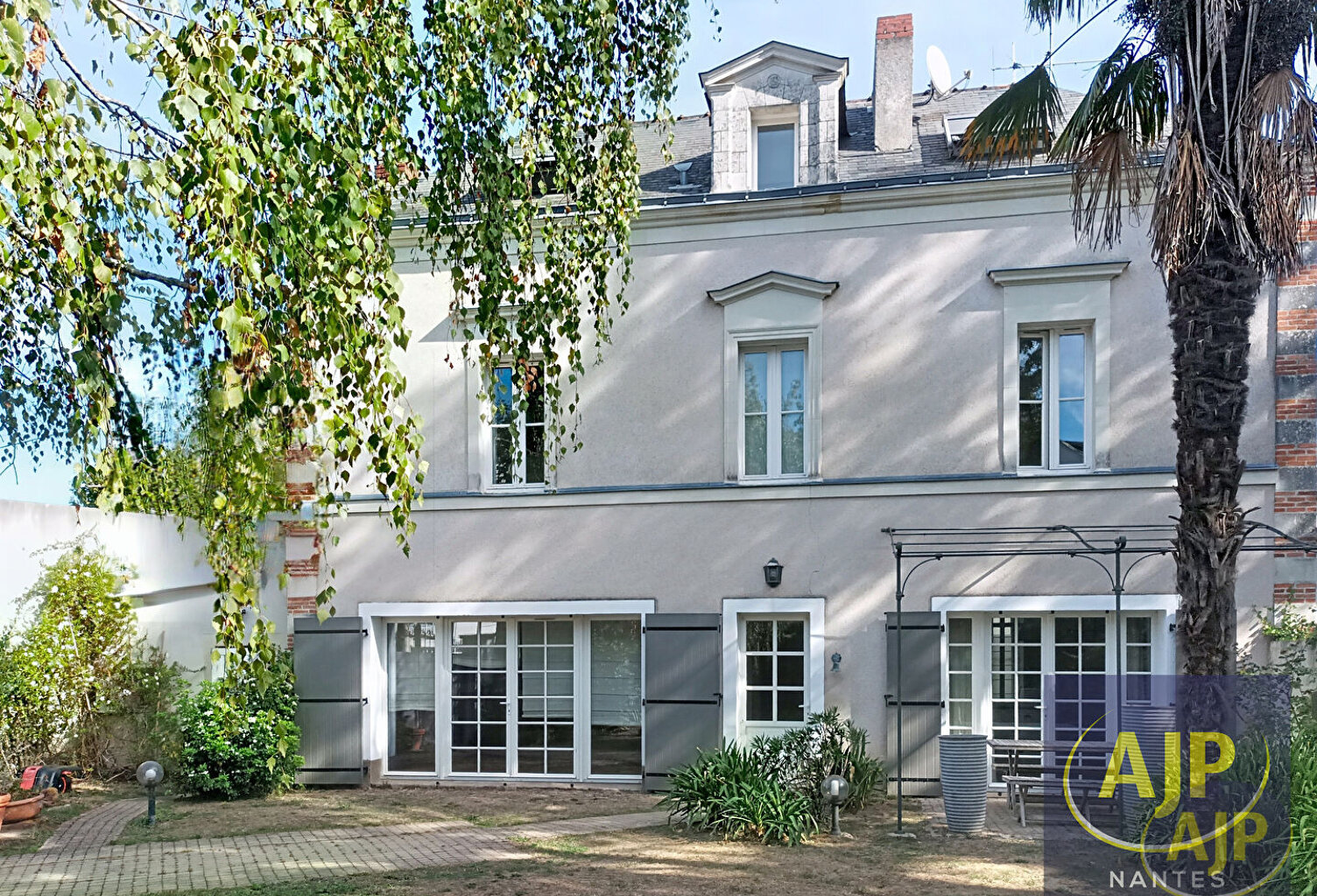 Maison Rond Pt de Rennes — photo 1