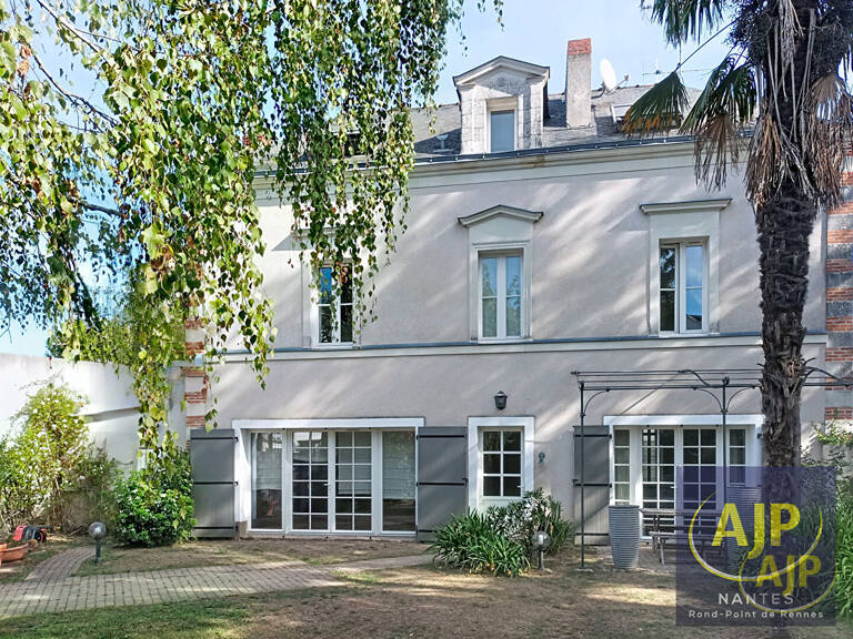 Maison Rond Pt de Rennes — photo 1