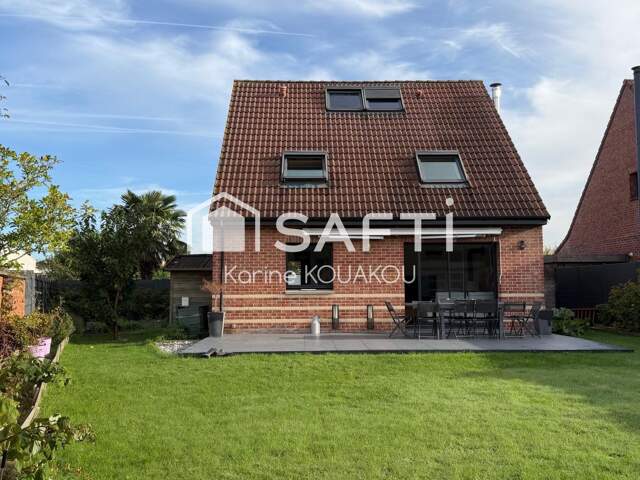 Venez découvrir cette jolie maison individuelle de 104m2 idéalement situé à deux pas du centre ville de Roncq et proche de toutes commodités . — photo du bien